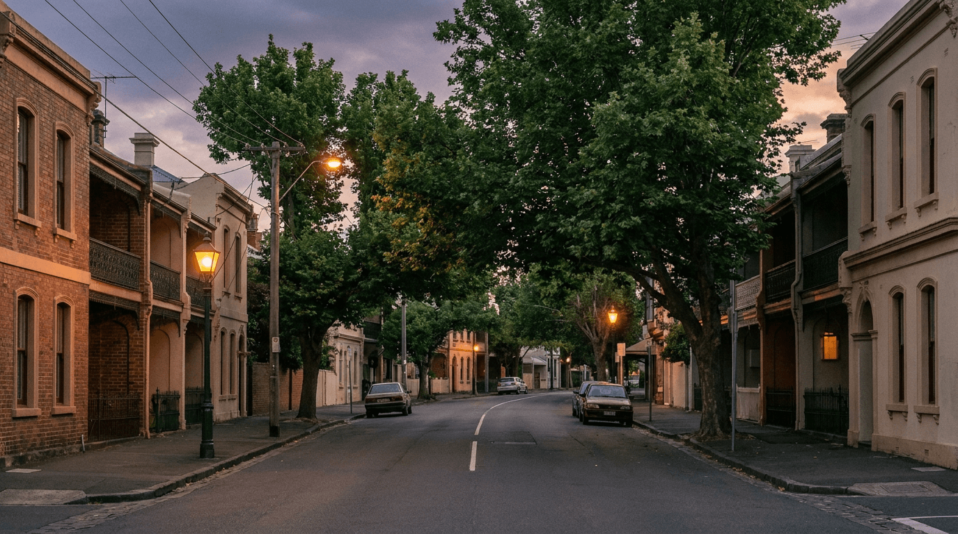 Australian inner-suburban street at twilight with terrace houses evoking local council infrastructure and rates